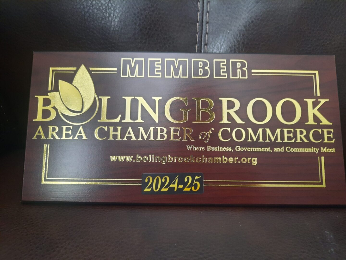 Local transportation service in Bolingbrook, Bolingbrook Chamber of Commerce member plaque from 2024, from Stop & Go Limo Airport Shuttle Service.