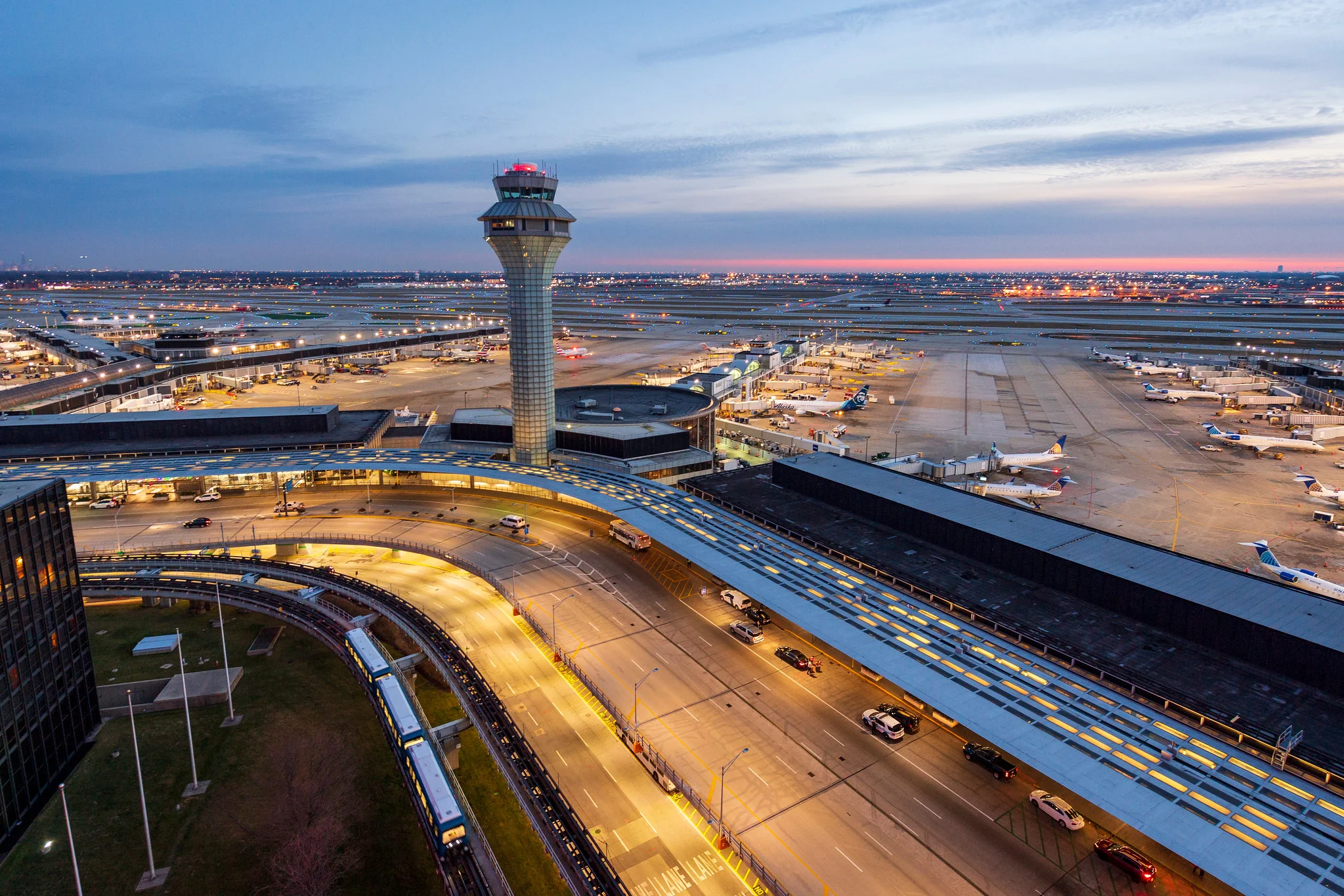 Local airport shuttle service in Chicago, Chicago O'Hare International Airport tower, Airport Shuttle Service serving Joliet, from Stop & Go Limo Airport Shuttle Service.
