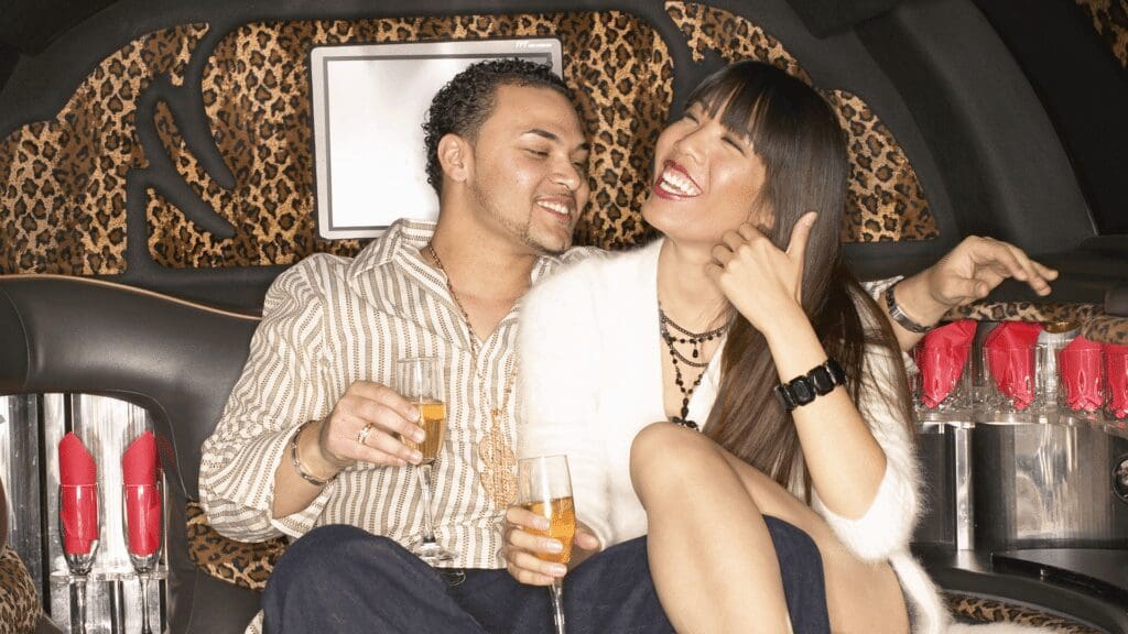 Local airport shuttle service in New Lenox, Couple enjoying a luxury limousine ride, Airport Shuttle Service, New Lenox, Illinois, from Stop & Go Limo Airport Shuttle Service.