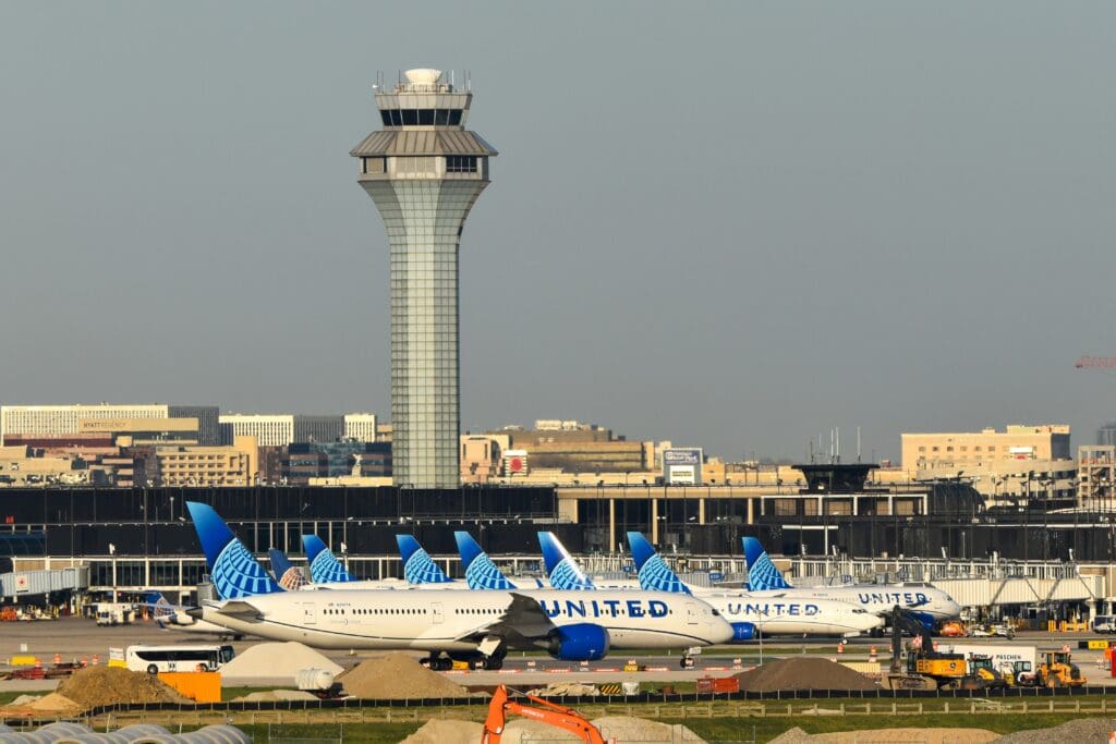 Local airport shuttle service in Chicago, Chicago O'Hare International Airport terminal and control tower, from Stop & Go Limo Airport Shuttle Service.