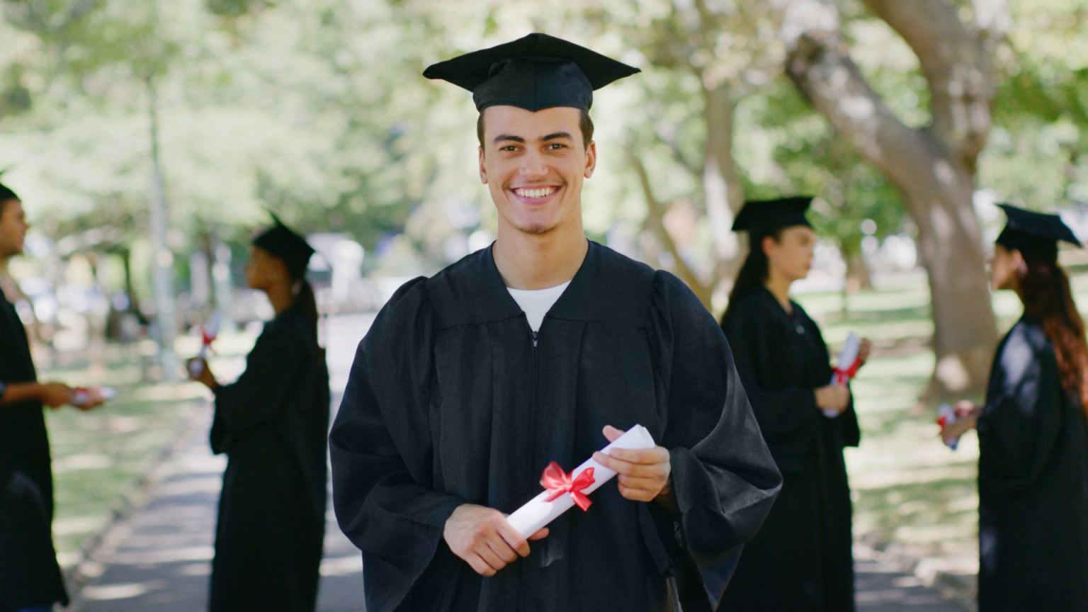 Local airport shuttle service in Chicagoland, Smiling graduates celebrating on graduation day with Airport Shuttle Service, from Stop & Go Limo Airport Shuttle Service.