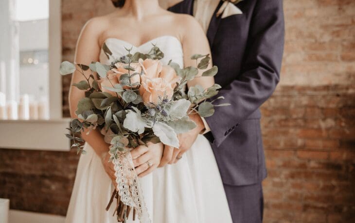 Local airport shuttle service in Chicagoland, Couple after their wedding using Airport Shuttle Service transportation, from Stop & Go Limo Airport Shuttle Service.