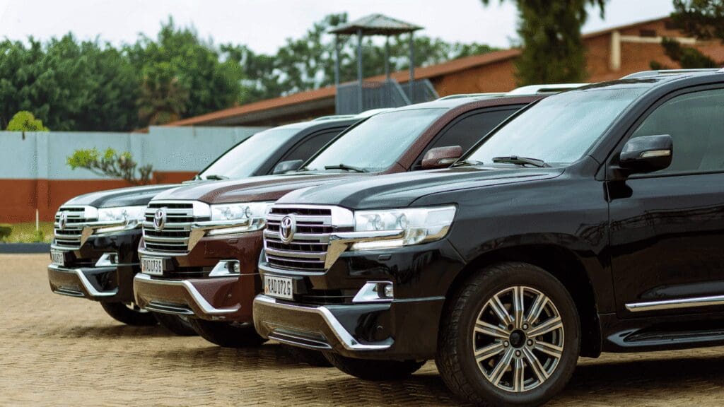 Local airport shuttle service in Chicagoland, Fleet of black Toyota SUVs ready for airport transfers, from Stop & Go Limo Airport Shuttle Service.