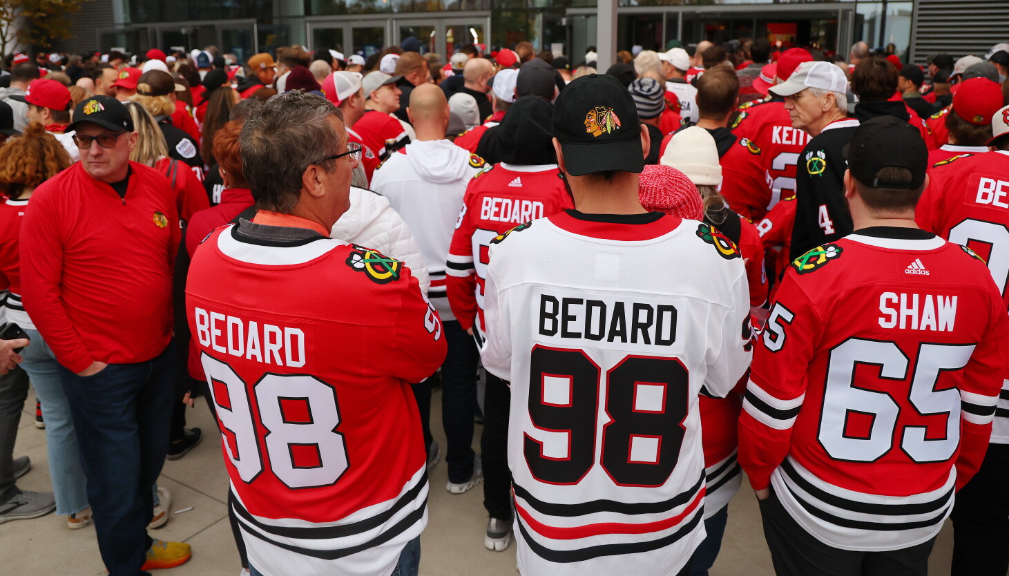 Local sports event transportation service in Chicago, Chicago Blackhawks fans traveling to a United Center game, from Stop & Go Limo Airport Shuttle Service.